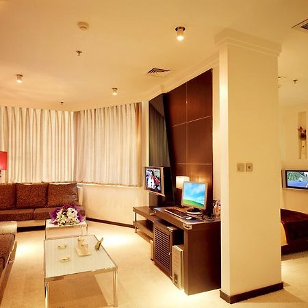 Dalian San Jiang Business Hotel Oda fotoğraf