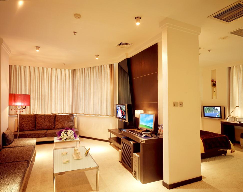 Dalian San Jiang Business Hotel Oda fotoğraf